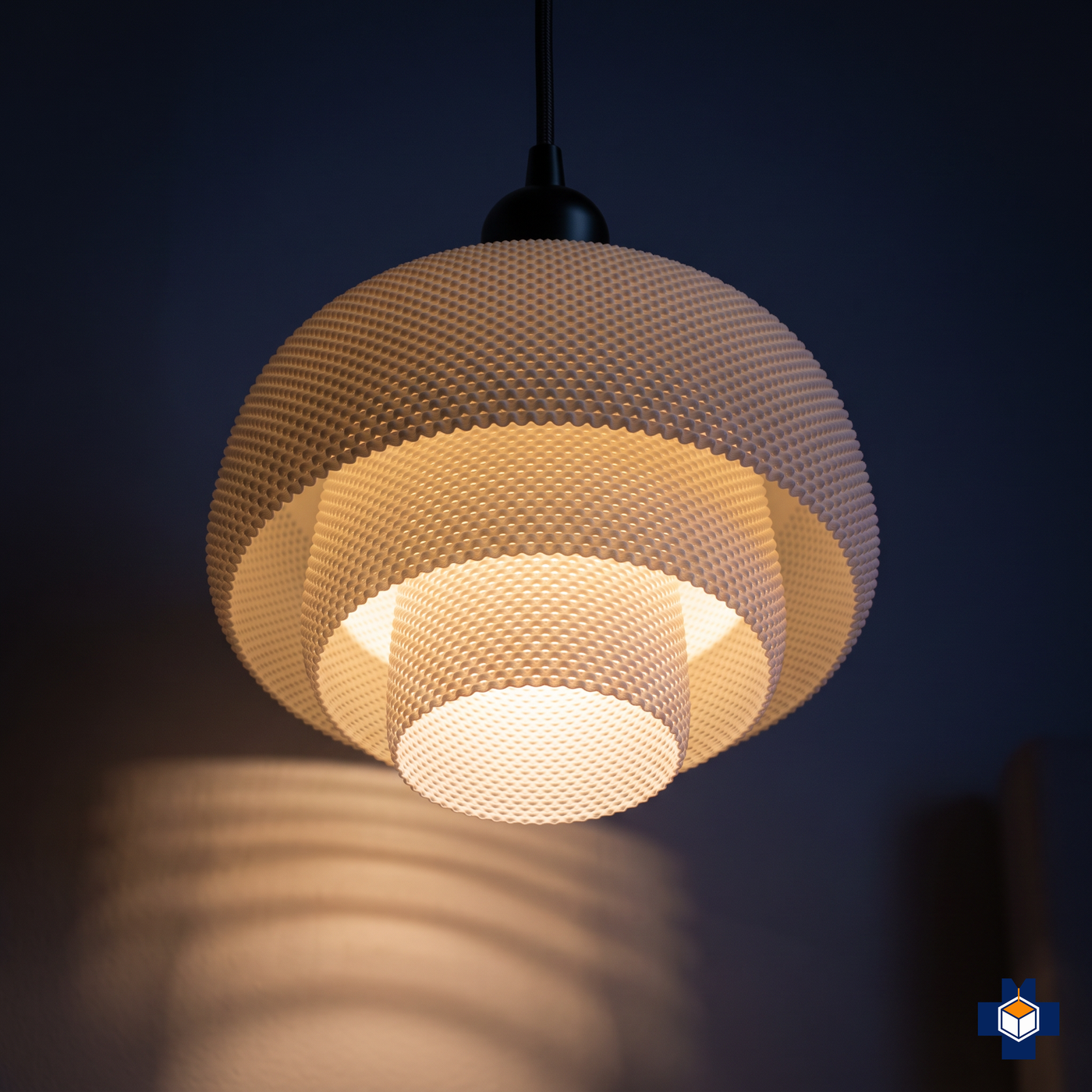 LUCIANA pendant glowing at night in banded light