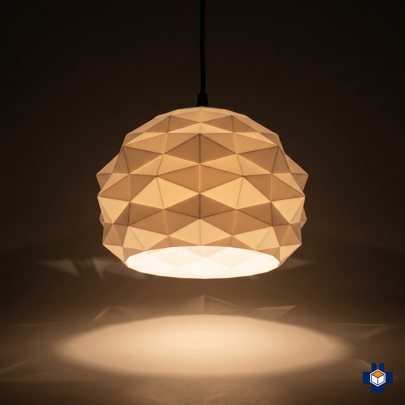 POLY faceted dome pendant glowing at night, architectural shadow