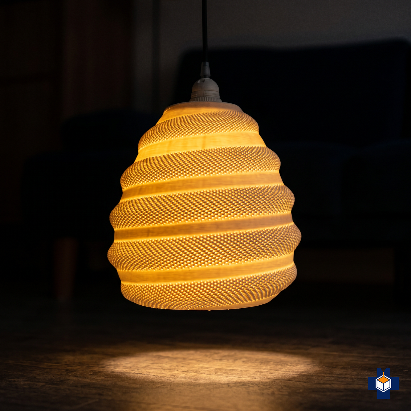 TORO beehive pendant glowing warmly at night
