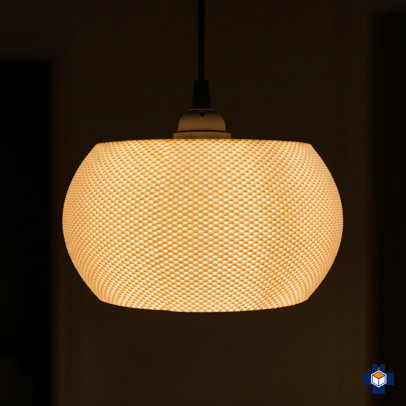 VALO rounded-pebble pendant glowing evenly at night